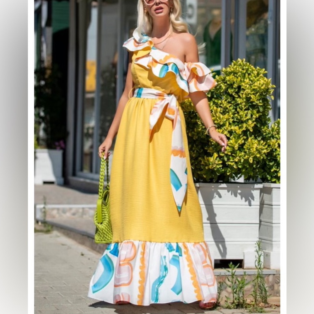 Brand new yellow dress with colorful ruffles